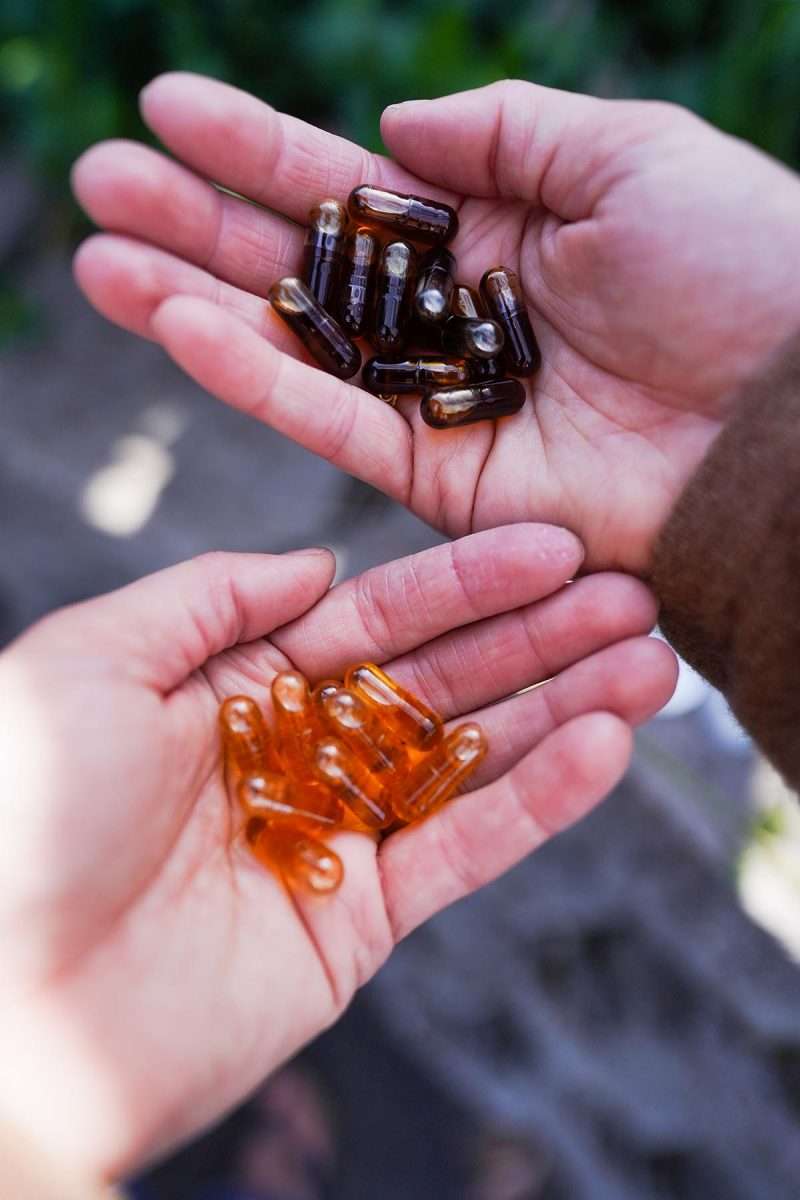 cbda cbga capsules in hands